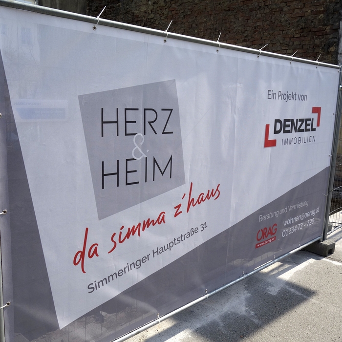 Bauzauntransparent mit Logo Herz&Heim